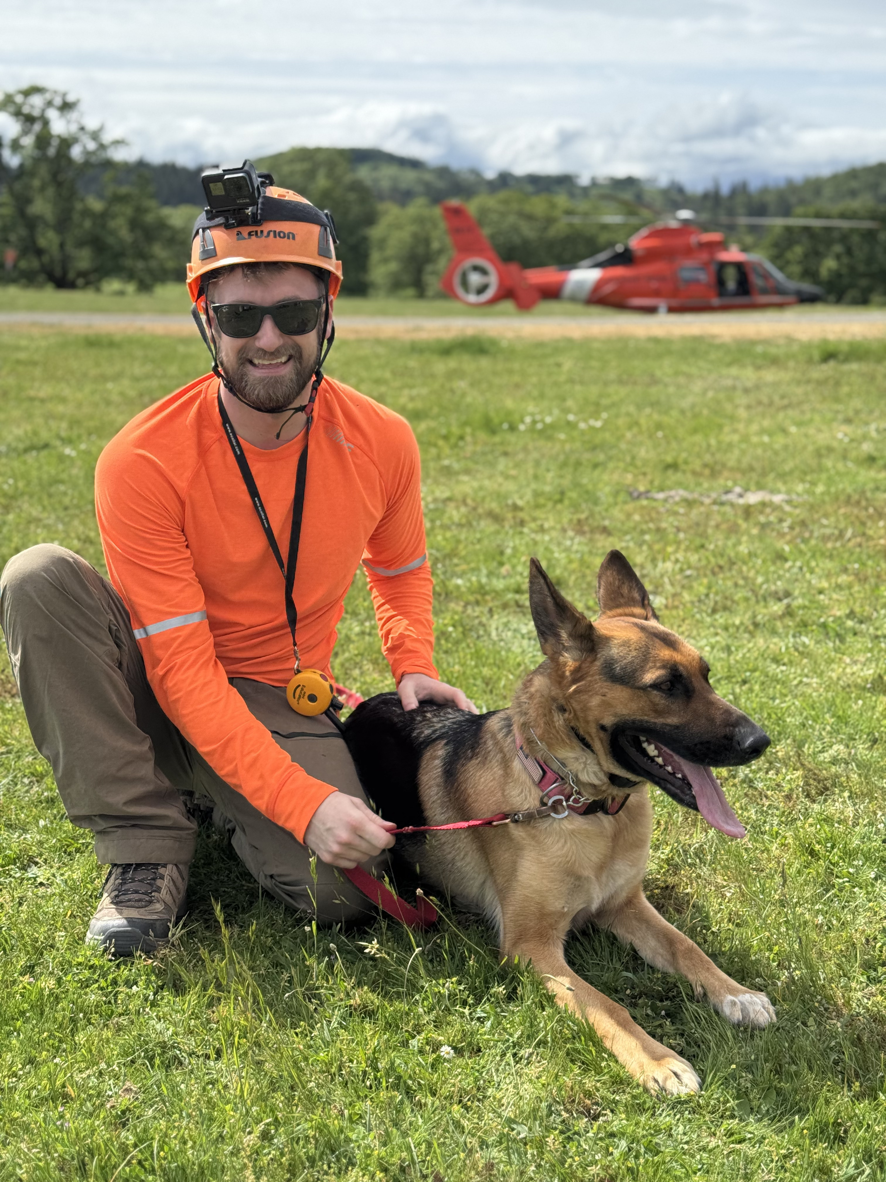 Mitchell Kilkenny and SAR K9 Nala at a helicopter search and rescue training field